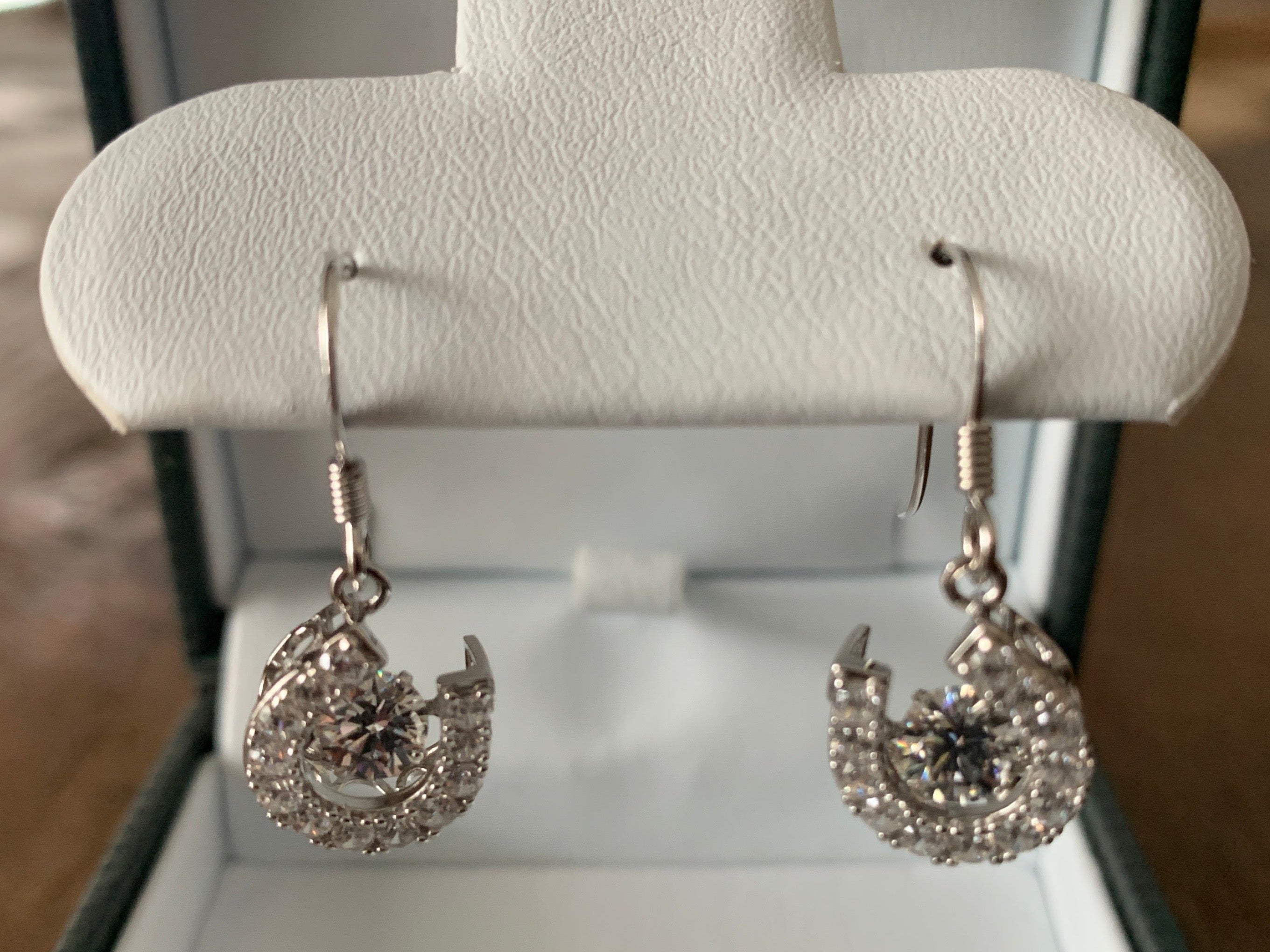 Horseshoe Dancing Stone Dangle Earrings in Sterling Silver