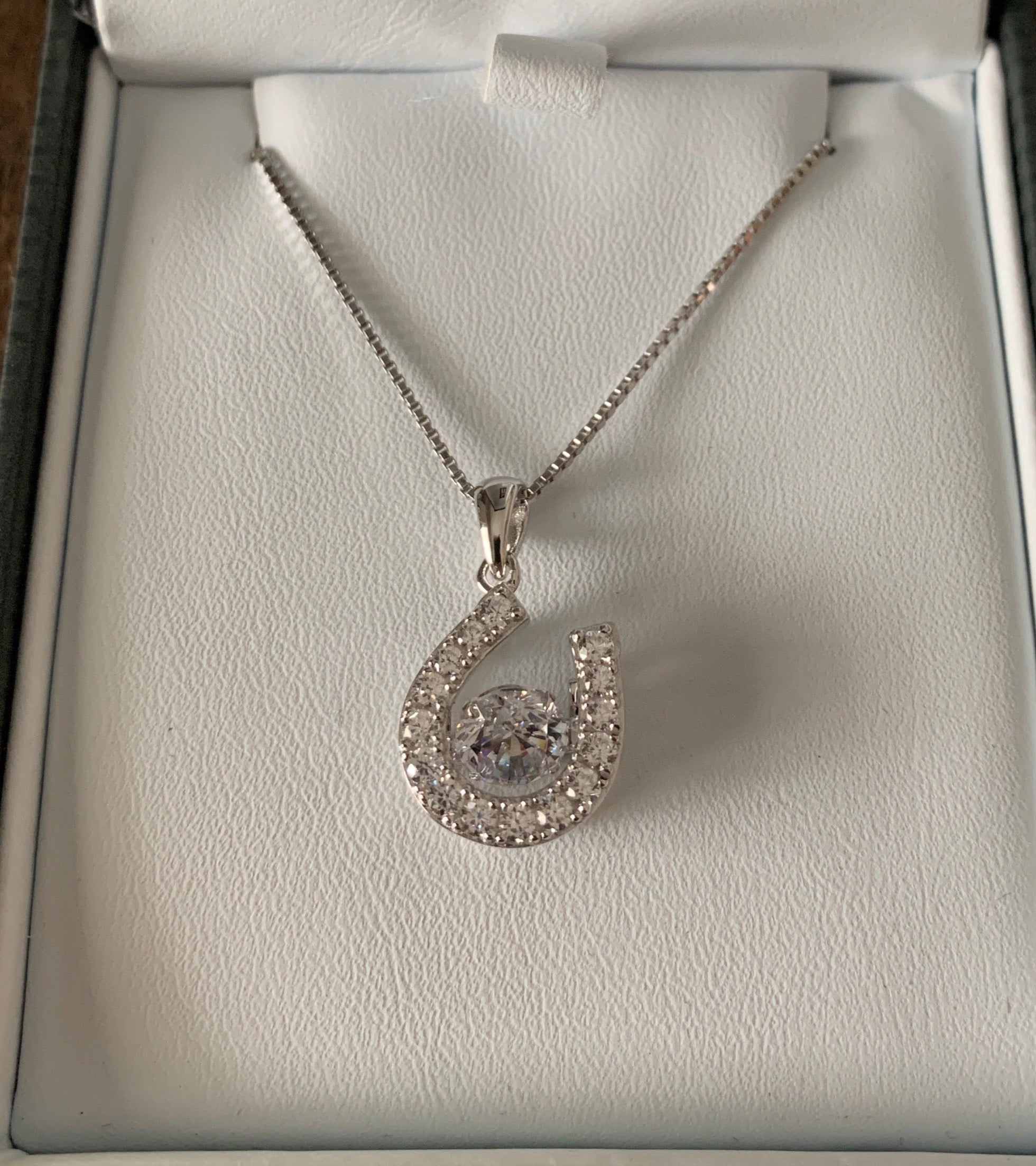 Horseshoe Dancing Stone Pendant Necklace in Sterling Silver