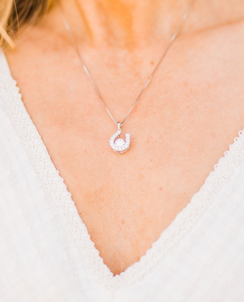 Horseshoe Dancing Stone Pendant Necklace in Sterling Silver