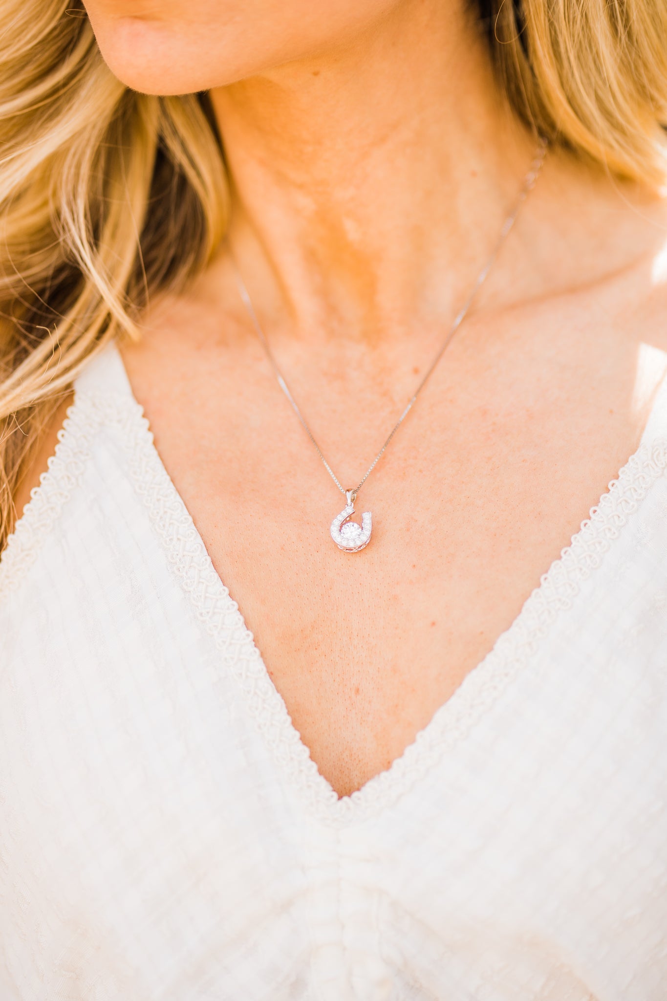 Horseshoe Dancing Stone Pendant Necklace in Sterling Silver